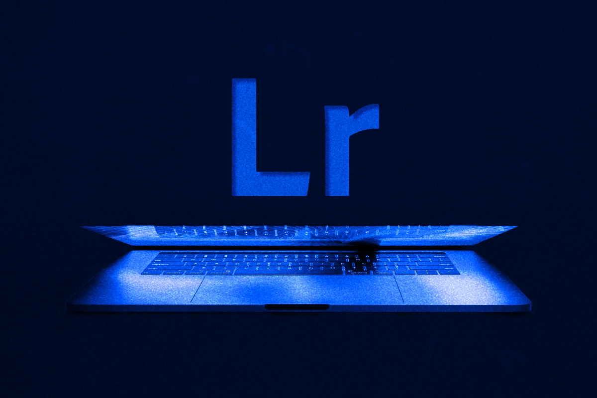 Half-open laptop glowing blue in the dark beneath a large floating "Lr" logo