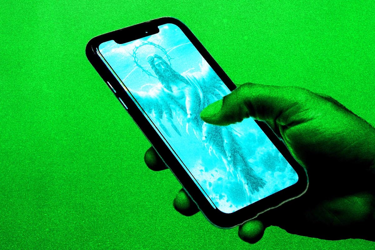 A hand scrolls a smartphone showing a glowing winged religious figure, all tinted acid green